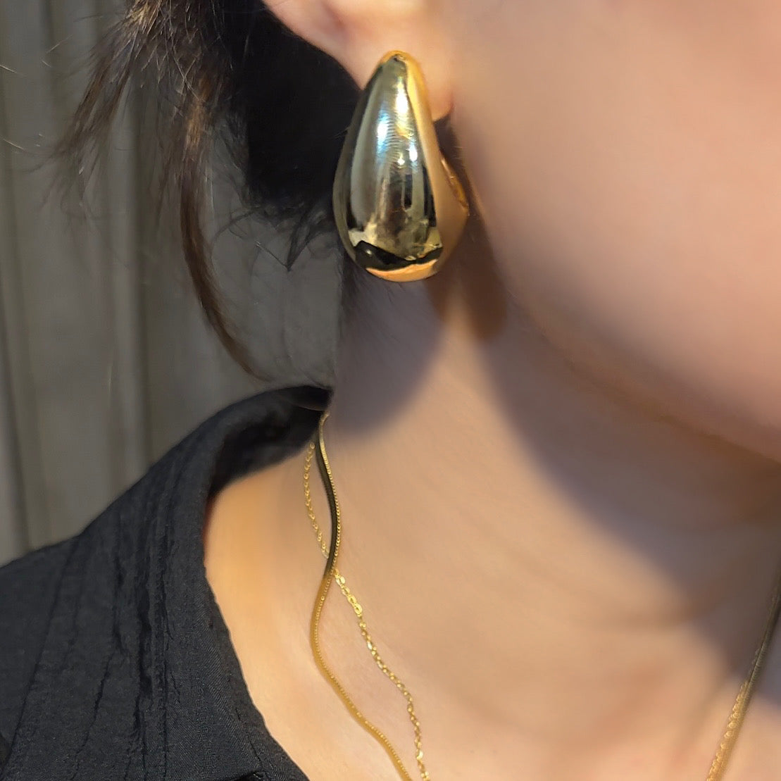 Gold Bottega drop earrings